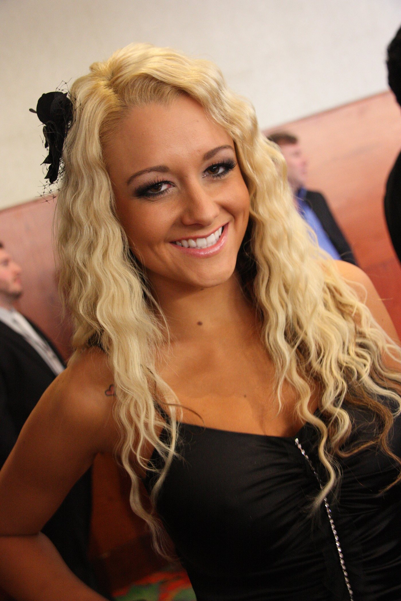 Briana Blair in a black dress, photographed at the 2010 AVN Adult Entertainment Expo